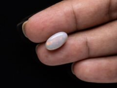 Australian Fire Opal Stone 3.27 carat in hand view
