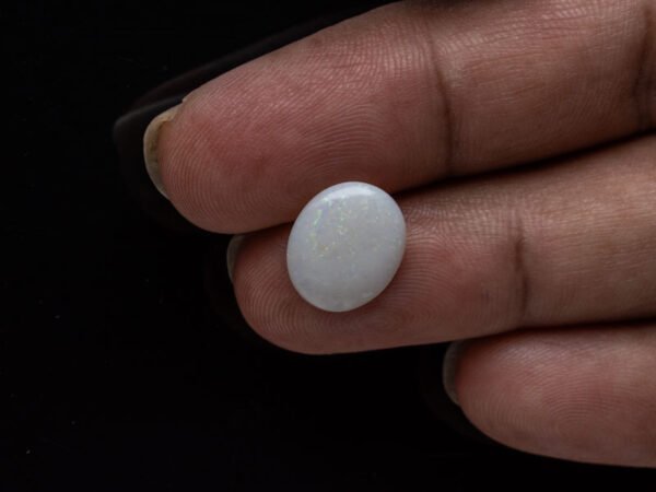 Australian Fire Opal Stone 3.33 carat in hand view