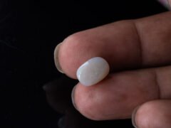 Australian Fire Opal Stone 3.5 carat in hand view