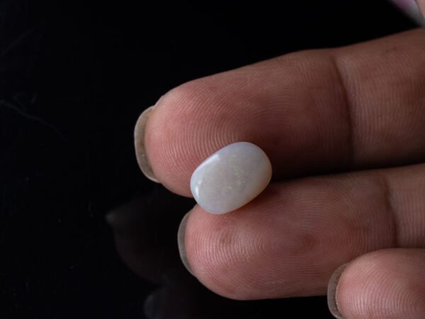 Australian Fire Opal Stone 3.5 carat in hand view