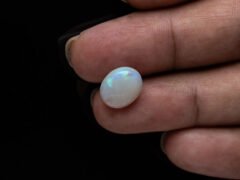 Australian Fire Opal Stone 3.64 carat in hand view