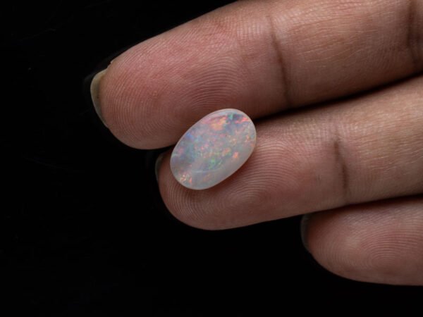 Australian Fire Opal Stone 2.99 carat in hand view