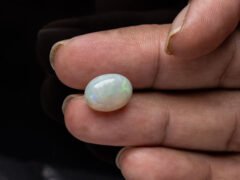 Australian Fire Opal Stone 5.14 carat in hand view