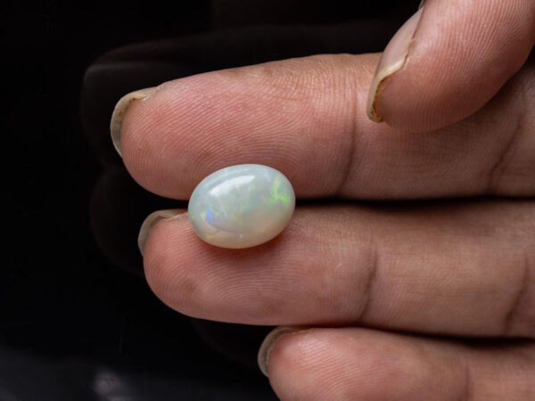 Australian Fire Opal Stone 5.14 carat in hand view