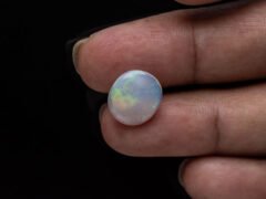Australian Fire Opal Stone 4.26 carat in hand view