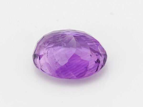 Amethyst Stone Jamunia 6.17 carat side view oval shape