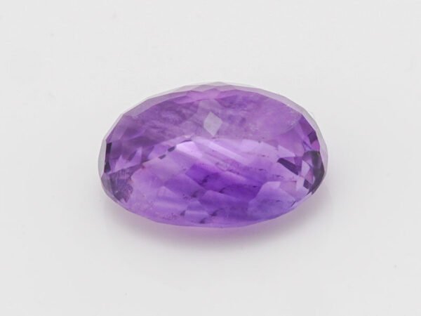 Amethyst Stone Jamunia 6.53 carat side view oval shape