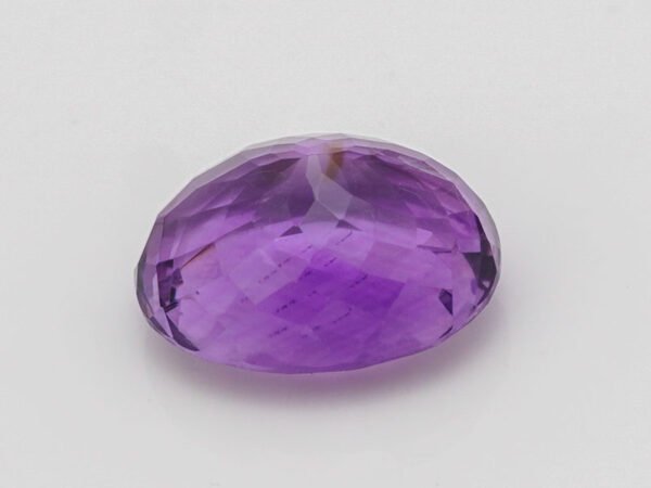 Amethyst Stone Jamunia 7.43 carat side view oval shape