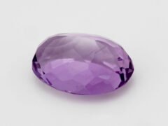 Amethyst Stone Jamunia 7.92 carat side view oval shape