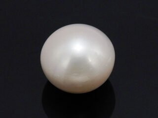 Cultured Pearl Moti 5.55 carat top view creamish white round shape