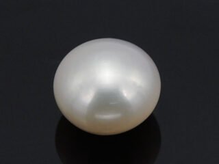 Cultured Pearl Moti 5.61 carat top view creamish white round shape