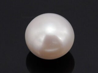 Cultured Pearl Moti 5.81 carat top view creamish white round shape