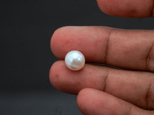 Cultured Pearl Moti 5.81 carat in-hand actual size