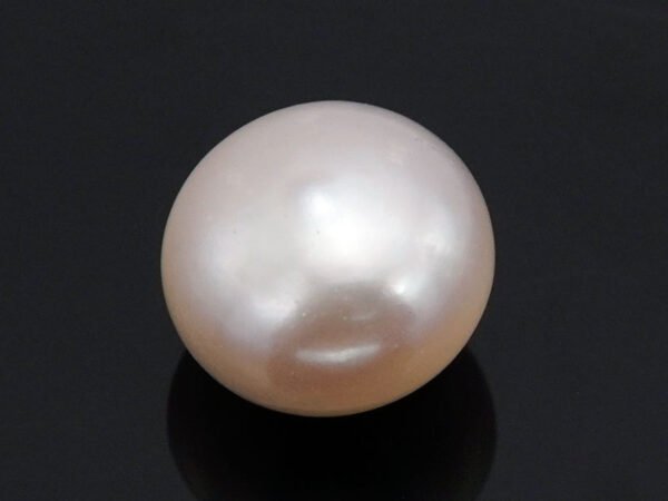 Cultured Pearl Moti 5.94 carat top view creamish white round shape
