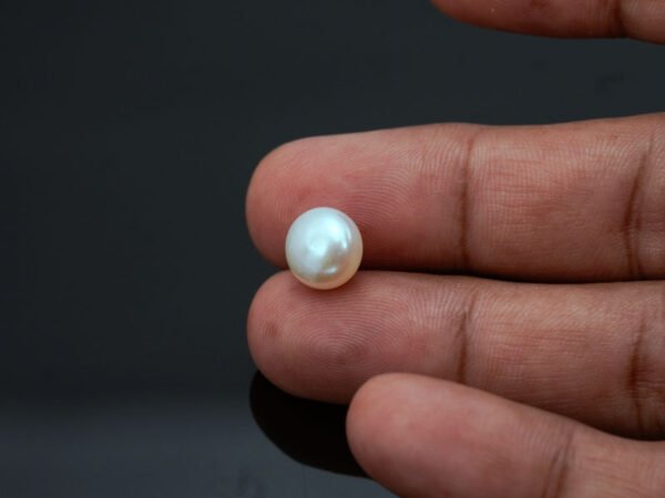 Cultured Pearl Moti 5.94 carat in-hand actual size