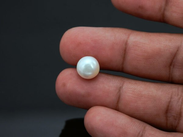 Cultured Pearl Moti 6.09 carat in-hand actual size