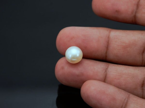 Cultured Pearl Moti 6.13 carat in-hand actual size