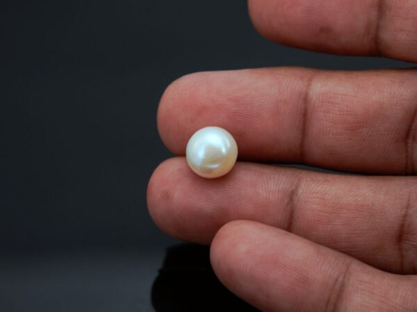 Cultured Pearl Moti 6.24 carat in-hand actual size