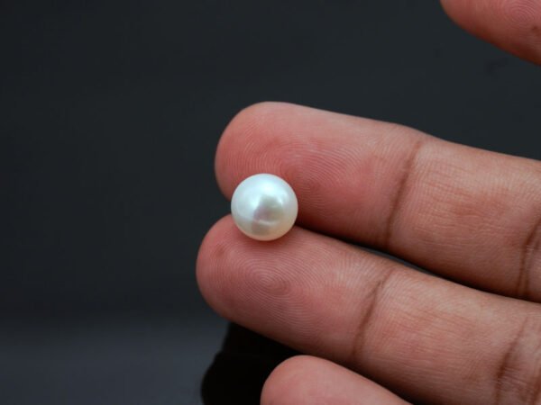 Cultured Pearl Moti 6.24 carat in-hand actual size