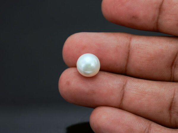 Cultured Pearl Moti 6.74 carat in-hand actual size