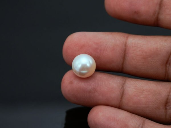 Cultured Pearl Moti 7.64 carat in-hand actual size