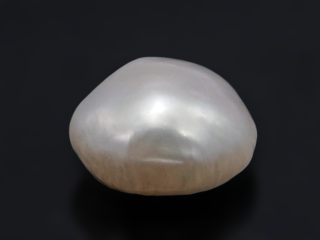 Keshi Pearl Moti 4.94 carat top view creamish white baroque shape