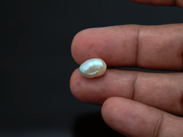 Keshi Pearl Moti 5.23 carat in-hand actual size baroque shape