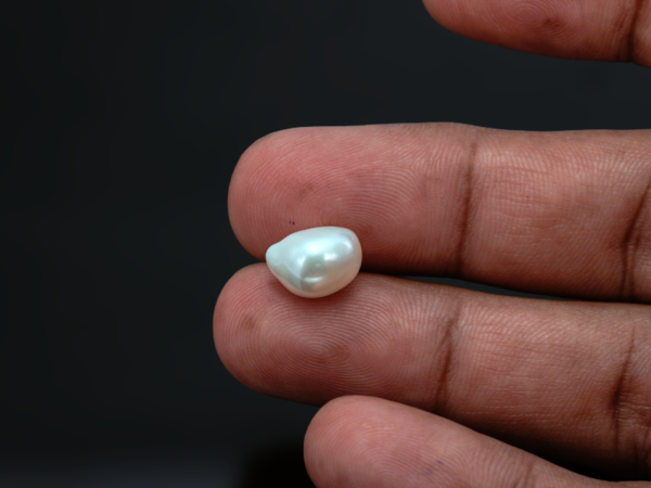 Keshi Pearl Moti 5.92 carat in-hand actual size baroque shape