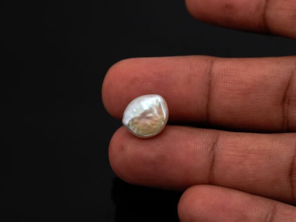 Keshi Pearl Moti 5.52 carat in hand actual size reference