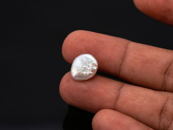 Keshi Pearl Moti 5.61 carat in hand actual size reference