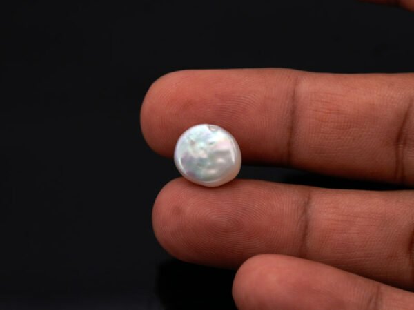 Keshi Pearl Moti 5.76 carat in hand actual size reference