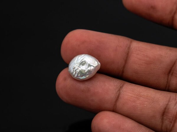 Keshi Pearl Moti 5.81 carat in hand actual size reference