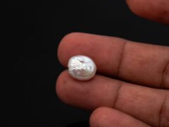 Keshi Pearl Moti 5.86 carat in hand actual size reference