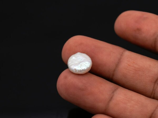 Keshi Pearl Moti 5.89 carat in hand actual size reference