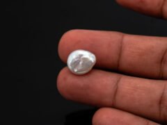 Keshi Pearl Moti 5.92 carat in hand actual size reference