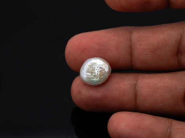 Keshi Pearl Moti 6.11 carat in hand actual size reference