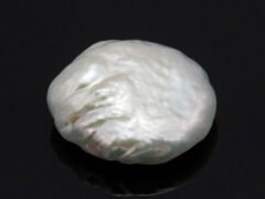 Keshi Pearl Moti 6.12 carat front view creamish white baroque shape