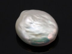 Keshi Pearl Moti 6.15 carat front view creamish white baroque shape