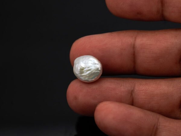 Keshi Pearl Moti 6.15 carat in hand actual size reference